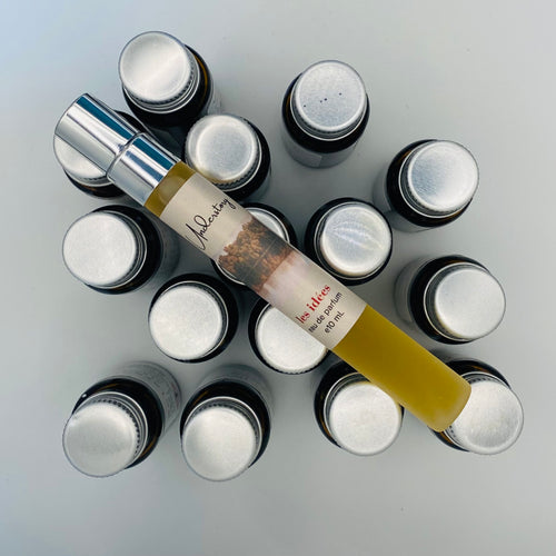 Collection of small bottles with a central tube labeled 'understory' on a light gray background