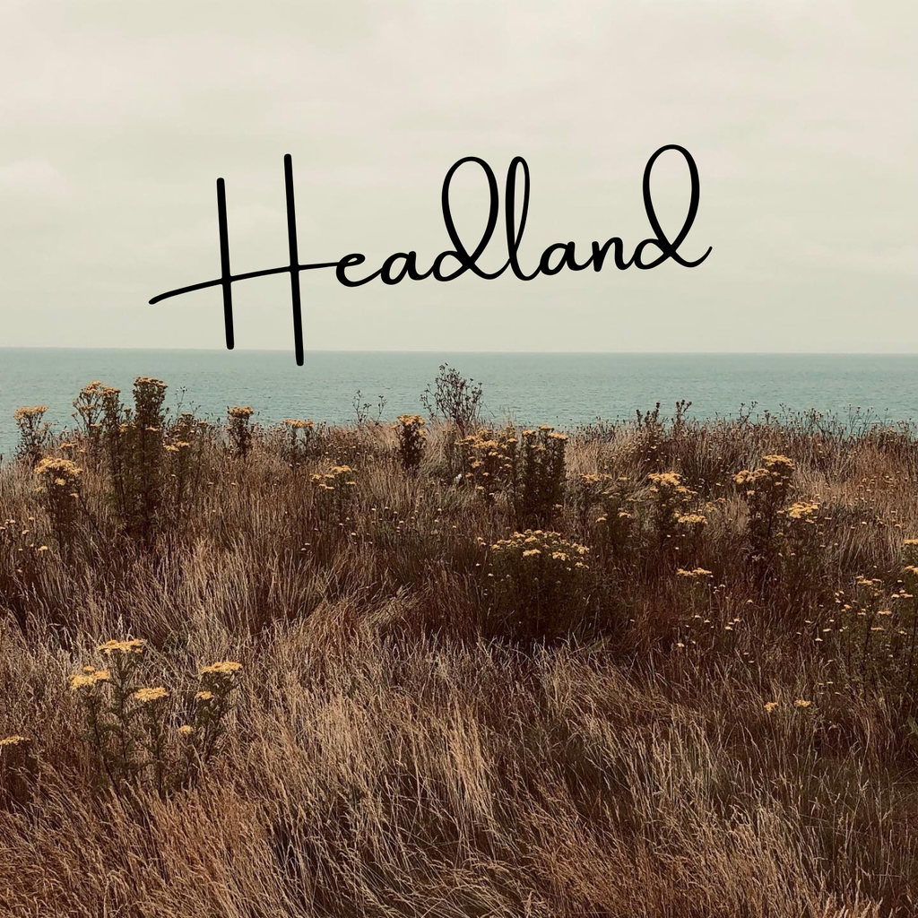 Scenic view of a coastal landscape with 'Headland' text overlay artwork for Les Idees Parfums Eau de Parfum